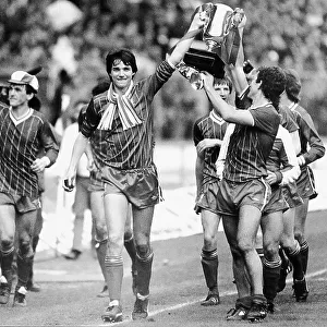 The victorious Liverpool team with the Milk Cup 1983