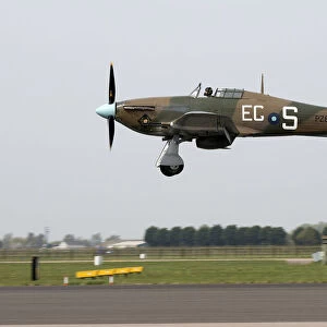 A Hurricane Mk IIC which forms part of the BBMF above RAF Conningsby