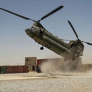 An RAF Chinook helicopter making the tricky approach to the Helicopter Landing Site
