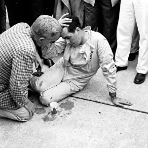 1959 United States Grand Prix. Sebring, Florida, USA. 10-12 December 1959. Jack Brabham collapsed after pushing his Cooper T51-Climax across the line to finish 4th