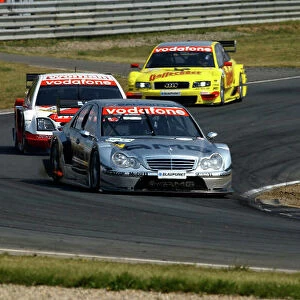 2004 DTM Championship Motopark Oschersleben, Germany. 5th - 8th August 2004. Jean Alesi (HWA Mercedes C-Class) Timo Scheider (OPC Holzer Opel Vectra GTS) action. World Copyright: Andre Irlmeier/LAT Photographic ref: Digital Image Only