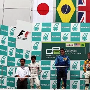 GP2 Asia Series: The podium: Kamui Kobayashi DAMS, second; Diego Nunes Piquet GP, race winner; James Jakes Super Nova Racing, third