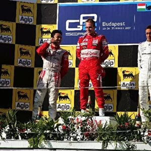GP2 Series: The podium: Kazuki Nakajima Dams, second; Adam Carroll FMS International, race winner; Andreas Zuber iSport International, third