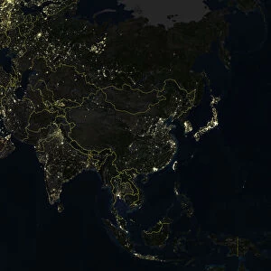 Asia At Night With Country Borders, True Colour Satellite Image. True colour satellite image of Asia at night with country borders. This image in Lambert Azimuthal Equal Area projection was compiled from data acquired by LANDSAT 5 & 7 satellites
