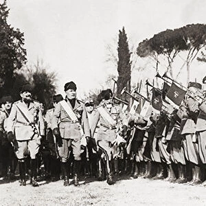 Benito Mussolini inspecting troops. Benito Amilcare Andrea Mussolini, 1883 - 1945. 27th Prime Minister of Italy. Also known as Il Duce, or The Leader. Head of Italian government during World War II