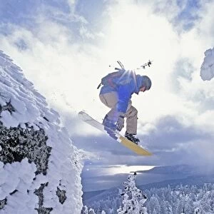 Diamond Peak, Lake Tahoe, Nevada, Usa; Man Snowboarding In Mid-Air