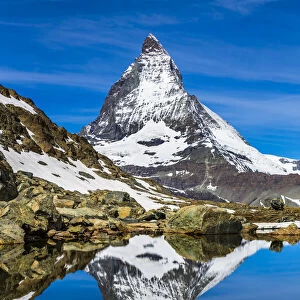 The Matterhorn reflected in a lake near Riffelsee at Zermatt, Switzerland