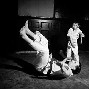 5 year old Judo expert in action. 29th December 1955 Local Caption