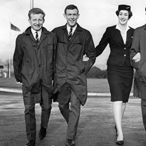 Air Hostess at Renfrew Airport escorts Celtic players Johnstone, Lennox & Gallagher