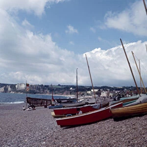 Boats on the beach in the small seaside town of Seaton on the South Devon coast