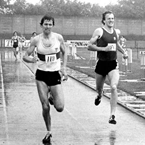 Brendan Foster squelches through the rain in an open athletics meeting at Gateshead in