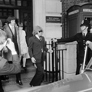 Brian Jones of The Rolling Stones leaving court with Prince Stanislaus Klossowski de Rola