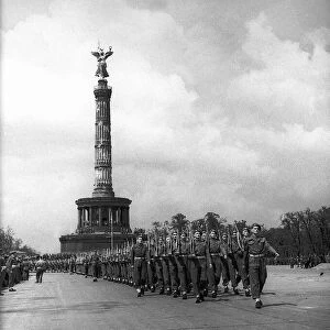British army soldiers during a parade at 200 ft Sieges Saule Column of Victory in Berlin