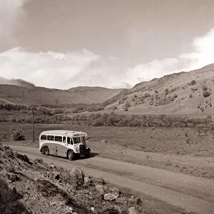 A bus journey in the highlands of Scotland circa 1950s transport road rural