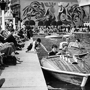 Children on boating lake at Festival of Britain 1951 in Battersea pleasure gardens