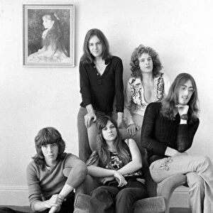Curved Air pop group, (seated front) Florian Pilkington - Milka, 21 (left)