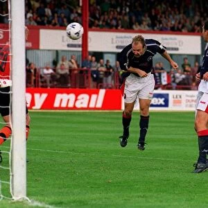 Dariusz Adamczuk Sept 1998 heads the equaliser for Dundee