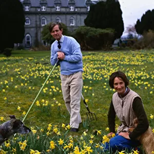 Duke and Duchess of Argyll in garden with dogs April 1988