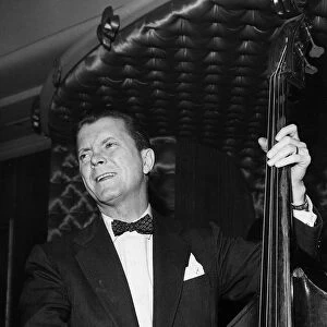 Eddie Condon Jazz musician with double bass 1957