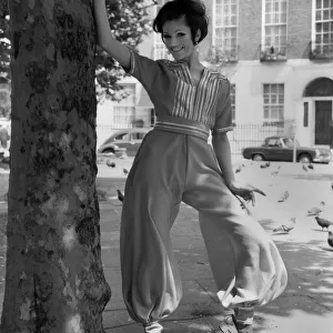Fashion 1960 s. Stevie Whittington in a Ali Baba Harem suit in tangerine