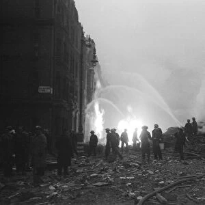 Firemen at work on Ebury Street, Pimlico. 16th April 1941