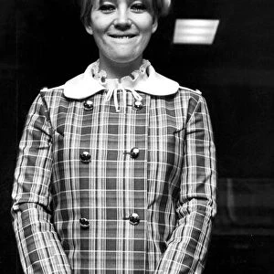 Julia Foster wearing bold check mini dress over trousers - 19th March 1968
