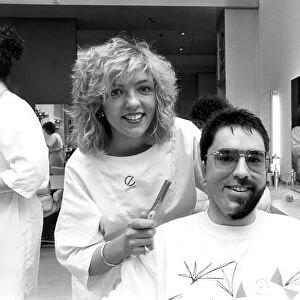 Julie Barker shaves half the beard off David Lees of Cramlington for Comic Relief in 1989
