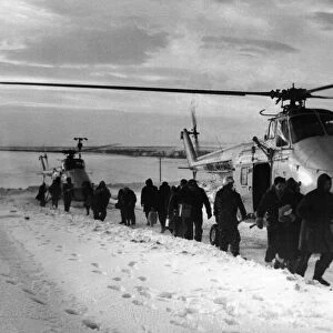 Looking like an Antartic expedition, workers at RAF Fylindales on the North Yorkshire