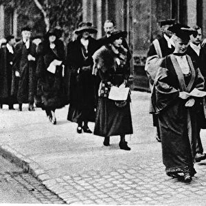 Lord Curzon Chancellor walking with the Queen after she graduated from Oxford with