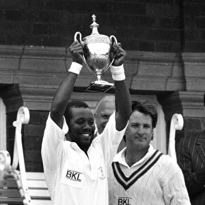 Malcolm Marshall cricketer holding the Benson Hedges Trophy after Hampshire beat Kent by