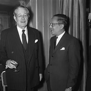 The Prime Minister Harold Macmillan talking to colleagues at the United Nations