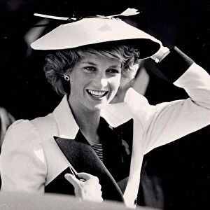 Princess Diana holding on to her hat during visit to America - November 1985