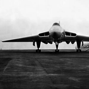 A RAF Avro Vulcan V-bomber touches down and brakes using it