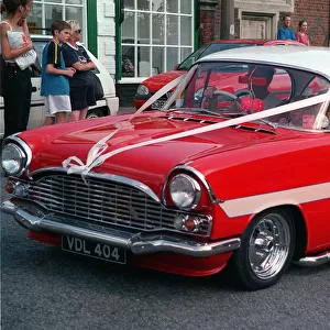 Red Custom Car Vauhall Cresta with White stripe on side