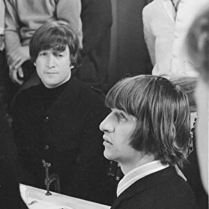 Ringo Star and John Lennon of the Beatles seen here at a reception for the band