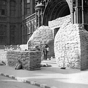 Sandbags being piled up outside Birmingham Magistrates court during the war