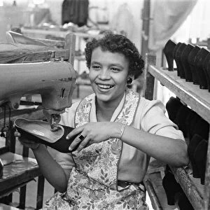 Stitching a upper of a shoe at the H Solomons shoe factory in Tottenham. 30th July 1956