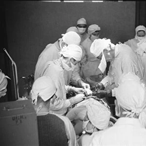 Surgeon professor Browne seen here performing a caesarian section operation to deliver