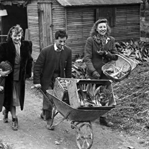 Vera Lynn and her husband Harry Lewis on their Sussex farm. March 1945