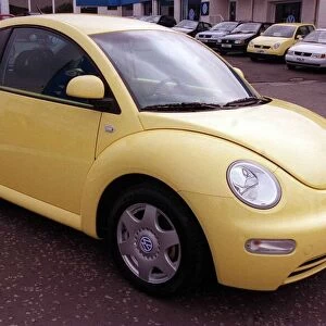 Volkswagen Beetle car April 1999 yellow