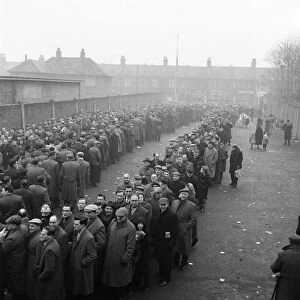 West Ham fans queue at Upton Park as tickets for their FA Cup match against Fulham go