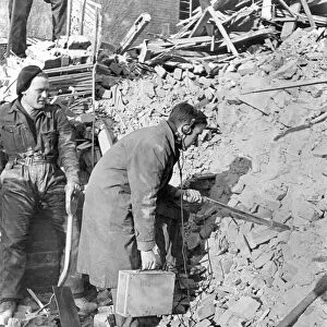 World War II: Hospital. Divining for Radium among the wreckage of what was the Marie