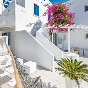 White wash architecture on Santorini Island, Greece. The view toward Caldera sea with relaxing summer travel vacation mood, vibes. Romance love couple