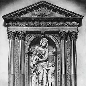 Madonna and Child with the infant St. John; sculptural group by Tommaso Lombardo, in the church of San Sebastiano in Venice