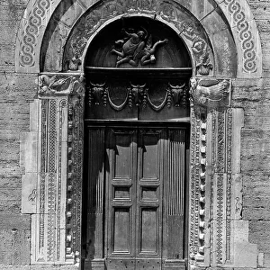 The portal of St. Michael's church by the Masters Binello and Ridolfo, located in Bevagna, province of Perugia
