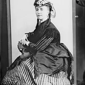 Portrait of woman sitting, in nineteenth century costume