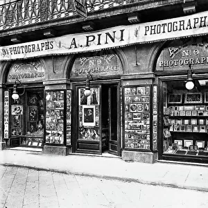 Shop windows of "A. Pini" photographic reproductions located on Lungarno, Florence