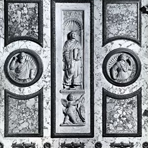 St. Lawrence among the prophets Isaiah and David. High-relief, long attributed to Mino da Fiesole. Sacristy of the church of St. Maria Maggiore, Rome