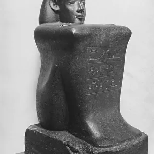 Statue-cube of Imenemipet, Egyptian functionary of the XXVI dynasty, preserved in the Louvre Museum, Paris