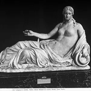 Statue of Naiad on display at the Louvre Museum, Paris